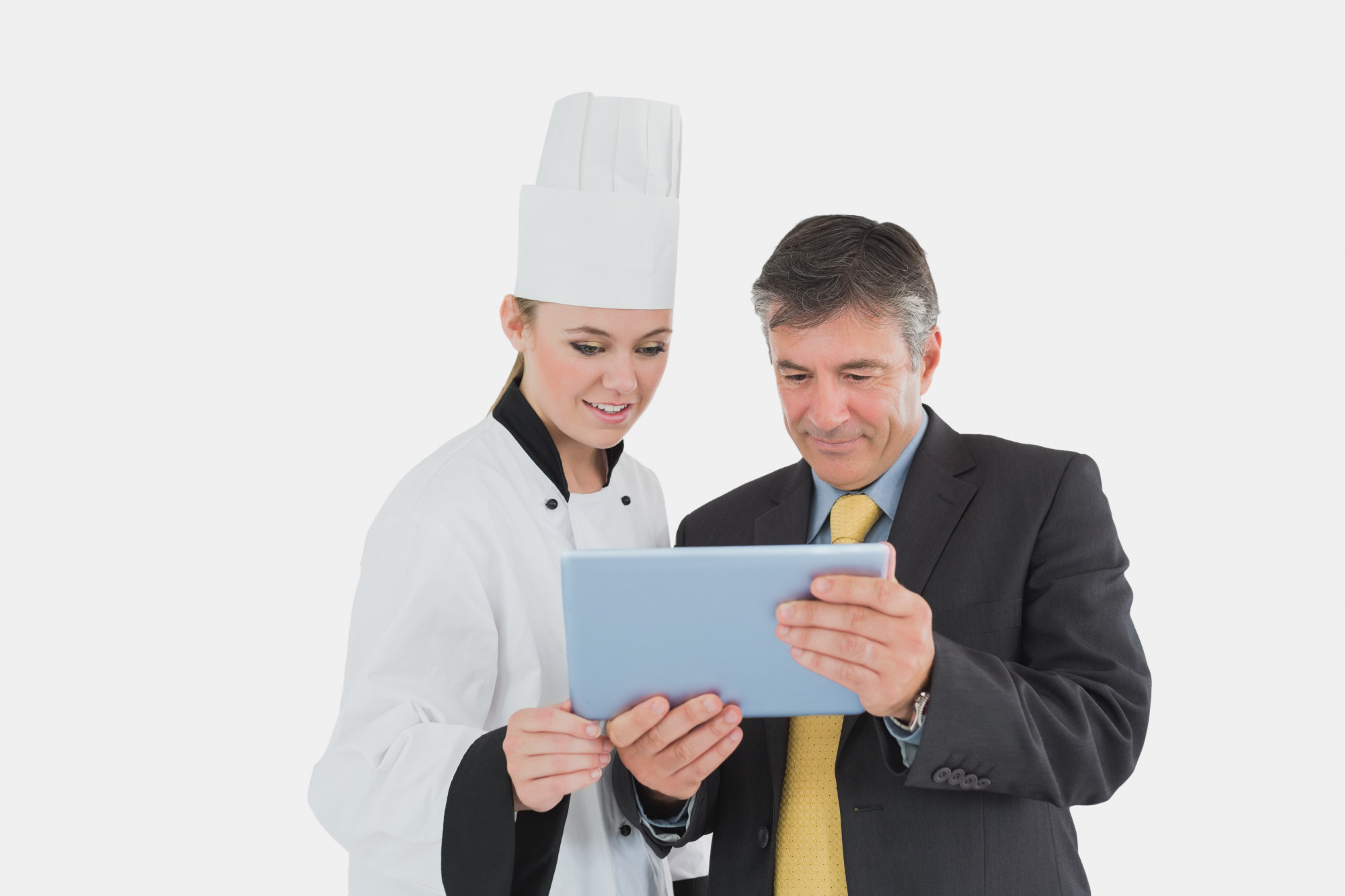 Team reviewing checklist in kitchen